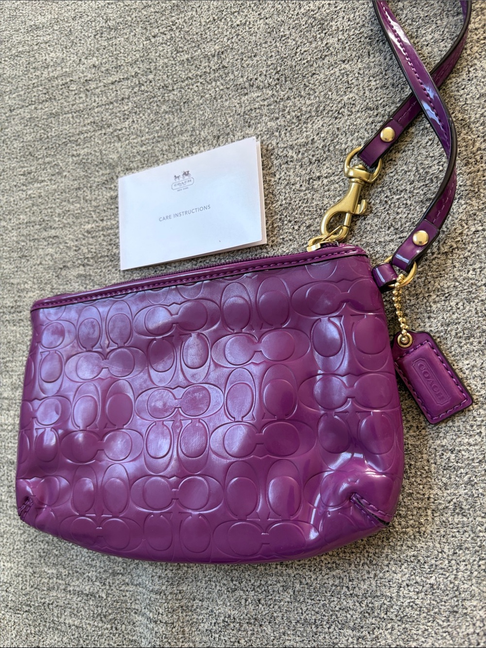 Coach Patent Signature Wristlet in Plum with Gold Heart Charm - Picture 2 of 5